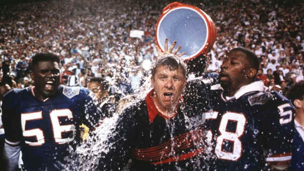 Giants head coach Bill Parcells gets doused with Gatorade with linebackers Lawrence Taylor, left, and Carl Banks, right, after the 20-19 win over the Bills in Superbowl XXV in Tampa, Fla. on Jan. 27, 1991